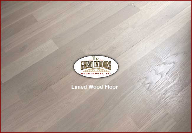 Limed wood floor with whitewash effect