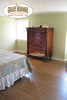 Bedroom with honey-colored oak floor