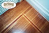 Using wood stain to create patterns in hardwood floors