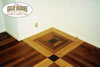 Wood inlay design accentuates an old hardwood floor